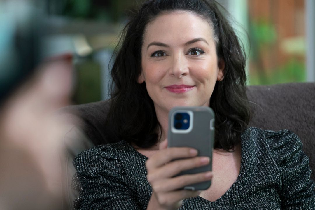 Andi (Jaime Andrews) gets caught making a vlog post.